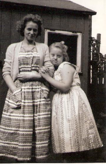 Edna May Bailey 1927 - 2010 and her sister Linda Joyce Beason, in their garden in Birmingham England